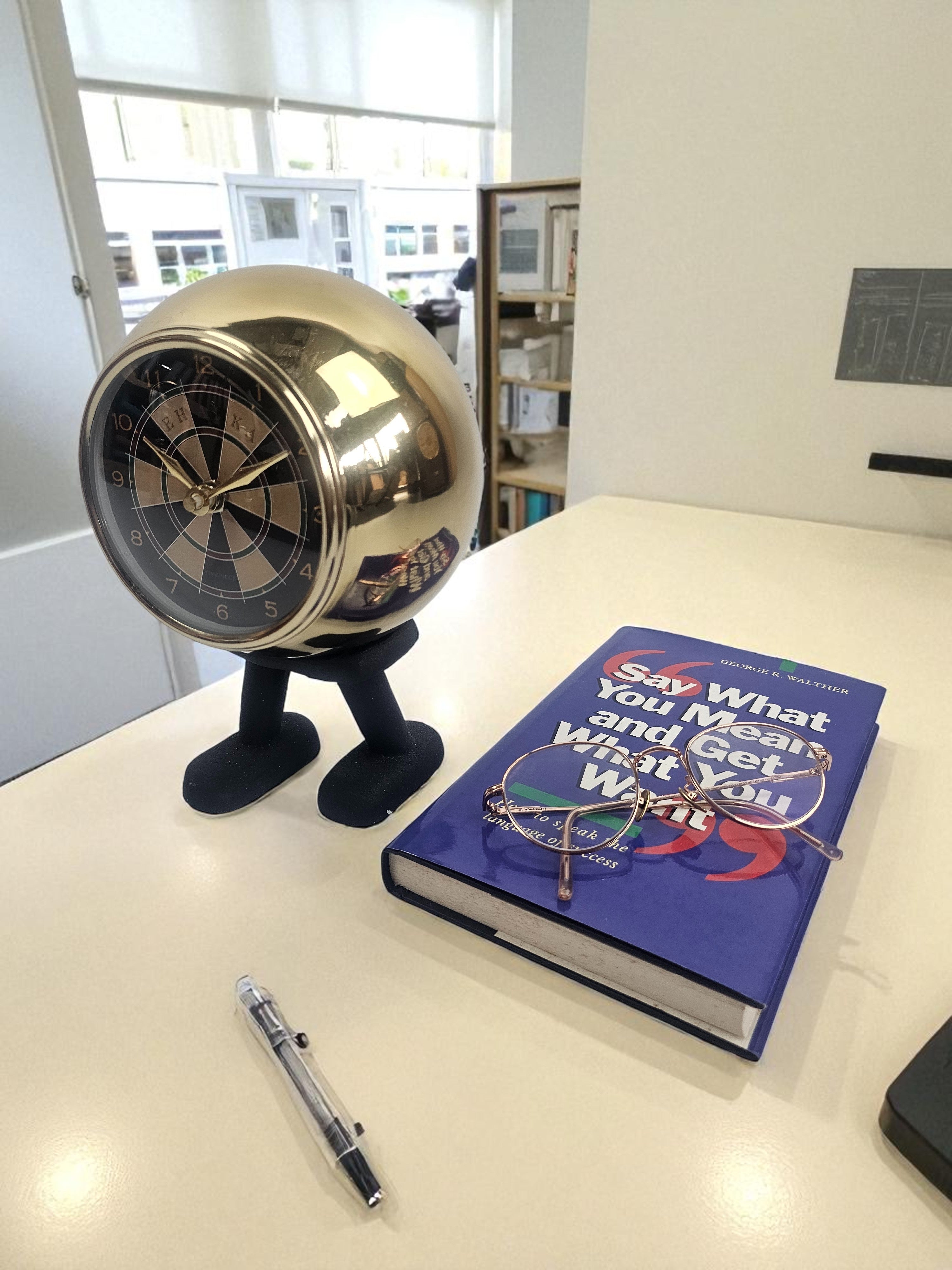 EHAIKA Cute Two Legged Table Clock, Darts Board Clockface, Metal Case & Plastic Stand