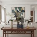 EHAIKA tribal mask set by Artistry Deco Shop featuring aluminium sculptures on a natural marble base, ideal for home or office decor.